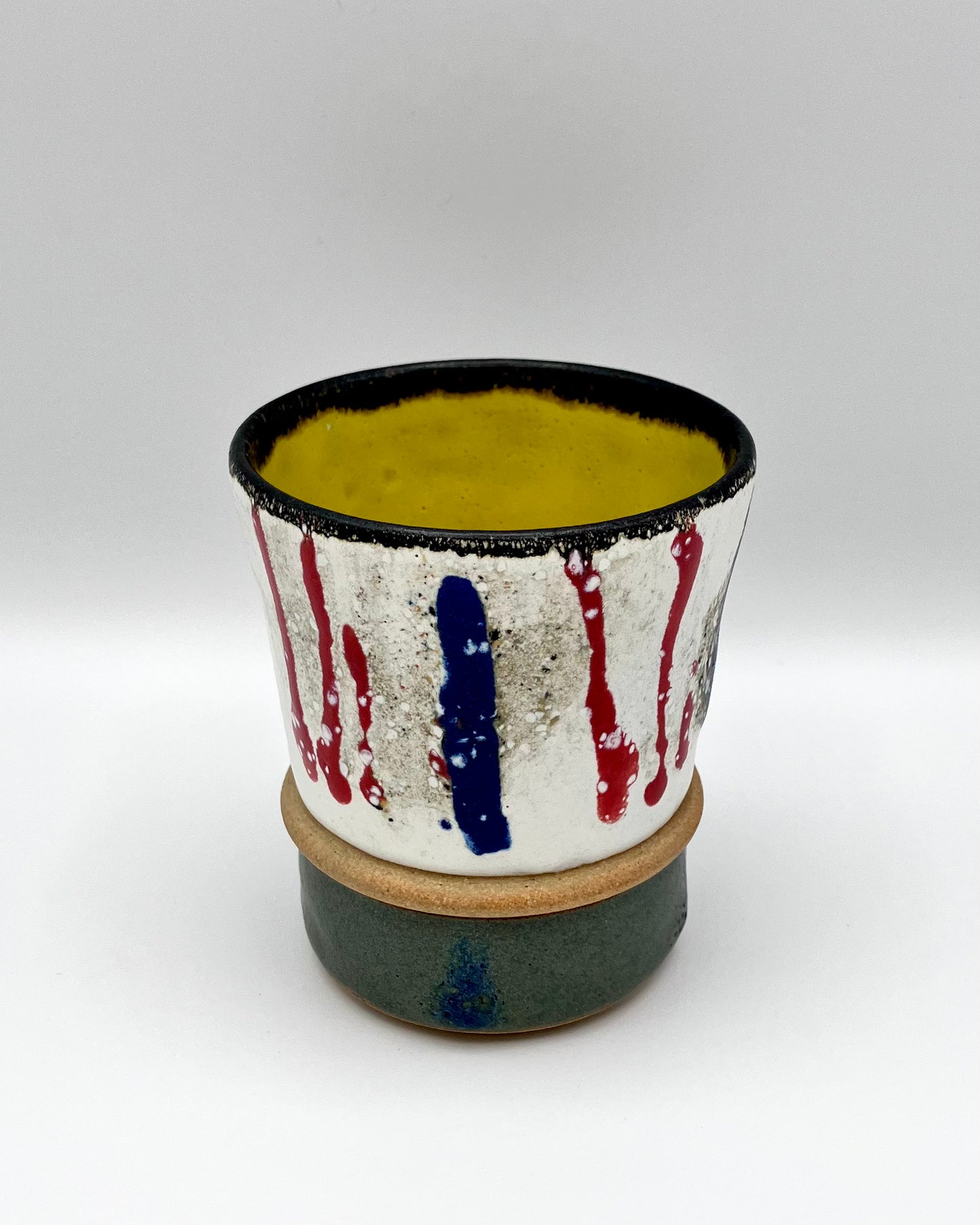 Red, blue, green, yellow cup (second)