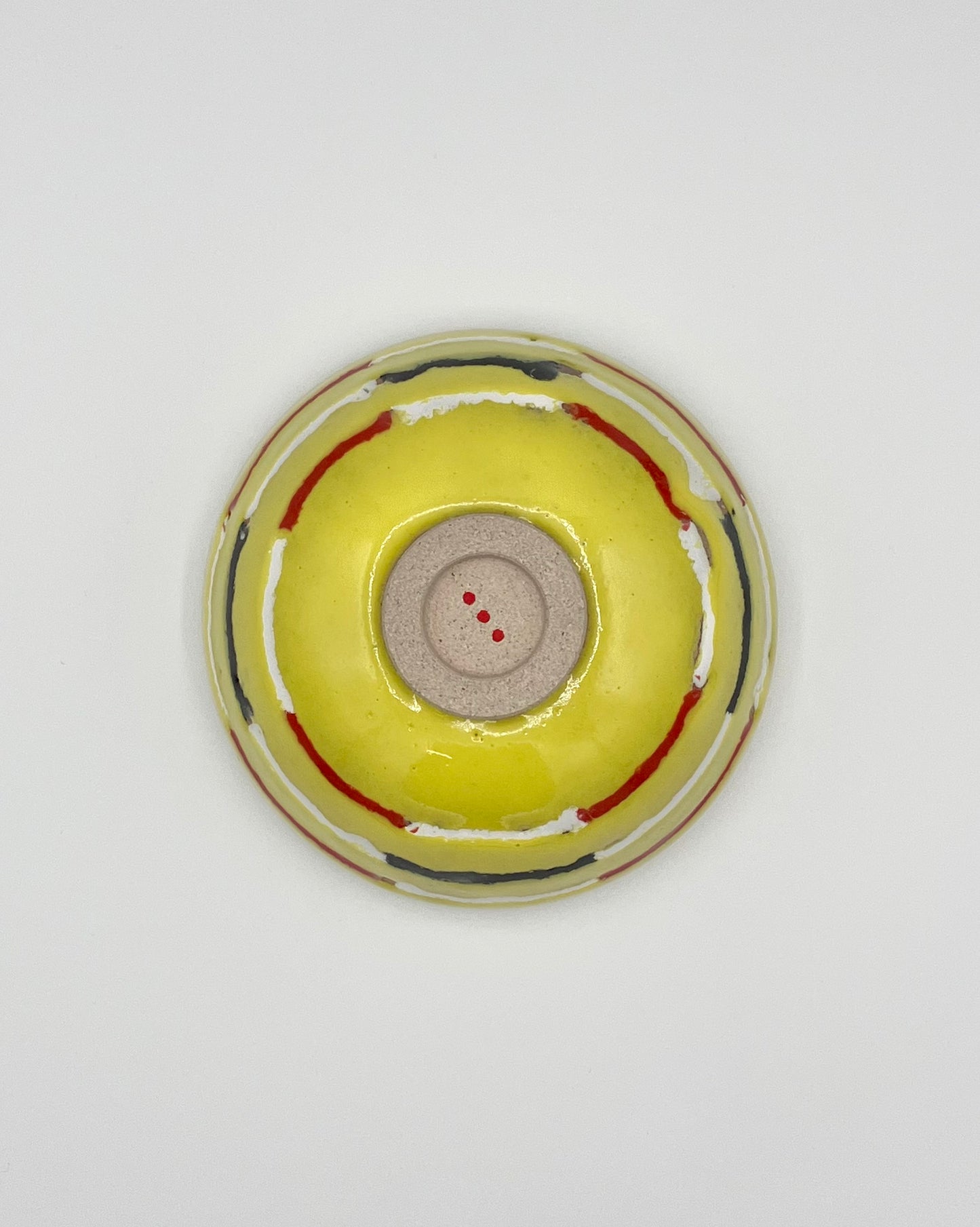 Yellow, red, white, black breakfast bowl